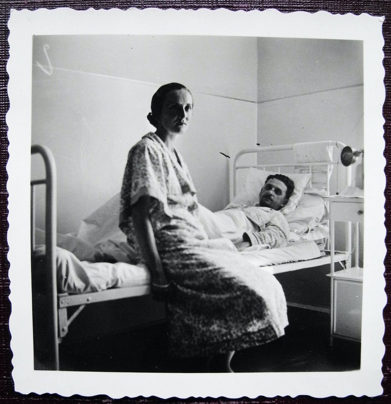 vintage photo of hospital patient with visitor