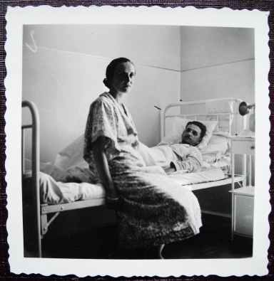 vintage photo of hospital patient with visitor